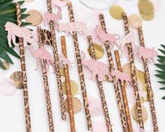 pink glitter giraffes on gold and leopard print sticks