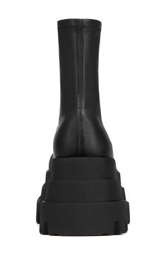 Bring a retro '90s attitude into your rotation with this skin-hugging platform boot featuring a sleek silhouette for a modern, minimalist look. Exclusive retailer 3 1/2" platform Synthetic upper/textile lining/synthetic sole Imported Modern Platform Boots With Lug Sole For Streetwear, Edgy Leather Platform Boots With Thick Bottom, Edgy Leather Platform Boots With Thick Sole, Modern Black Platform Boots, Modern High Ankle Platform Boots With Chunky Platform, Modern Leather Platform Boots With Chunky Platform, Modern Black Platform Boots For Streetwear, Modern Platform Boots For Streetwear, Modern Chunky Platform Boots