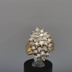 Vintage Estate 14k Yellow Gold 1.96ct. T.w. Diamond Cluster Ring Size 4 Item w#2711 Clean and polished to newer condition  Marked 14k 1.96 carat total weight Diamonds  Color I J Clarity I, I2 6.8 grams Round cut Genuine Natural Diamonds American Appraisal Association Estimated Retail replacement value $1125.00 Appraisal Included. We will provide 1 free complimentary sizing on this ring. Please notify us if sizing is needed prior to purchase so we may update the shipping time. Sizing will delay s Fine Jewelry Anniversary Cluster Rings, Dazzling Cluster Jewelry For Anniversary, 14k Gold Diamond White Cluster Wedding Ring, 14k Gold Cluster Diamond Ring With Prong Setting, Diamond White Cluster Jewelry With Diamond Accents, Classic Cluster Diamond Jewelry, 14k Gold Cluster Diamond Cut Wedding Rings, Dazzling Cluster Ring With Vvs Clarity For Anniversary, Cluster Diamond Ring For Wedding