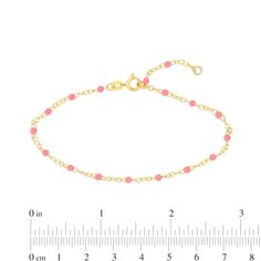 Bring attention to your style with this dainty beaded chain bracelet. 14K gold Small pink enamel beads are stationed at regular intervals along the link chain 2.0mm width 6.5- to 7.5-inch adjustable chain; spring-ring clasp Dainty Pink Beaded Chain Bracelet, Elegant Pink Beaded Chain Bracelet, Beaded Chain Bracelet, Enamel Beads, 5 To 7, Pink Enamel, Beaded Chain, Spring Rings, Link Chain