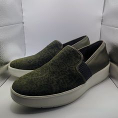 Brand: Clarks Size: 9.5 Wide Color: Olive Green Slip On Never Worn This Platform Sneaker Has An Effortless Slip-On Style, Round Toe Front For A Roomy Fit, And Traction Sole For Extra Stability. Comfortable Green Slip-on Sneakers With Round Toe, Green Walking Shoes With Round Toe, Green Leather Low-top Walking Shoes, Casual Green Slip-on Walking Shoes, Green Slip-on Synthetic Walking Shoes, Green Slip-on Sneakers With Round Toe, Medium Width Low-top Slip-ons With Rubber Sole, Casual Low-top Walking Shoes Medium Width, Casual Medium Width Low-top Walking Shoes