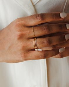 Forever glinting and gleaming, this rope chain ring never loses its sparkle. We love it paired with bands, signets and stacking rings for a pop of texture (or worn alone for a barely-there effect). Crafted in 10k solid gold to stand the test of time. Tip: if you’re in between sizes, size up for a comfier fit! 10k solid gold is:- more durable and scratch-resistant than 14k- made for a lifetime of 24/7 wear- nearly indistinguishable from 14k in color and shine- able to be polished and refinished i Classic Stackable Chain Ring For Promise, Classic Stackable Chain Promise Ring, Dainty 14k Gold Midi Rings With Diamond Cut, Everyday Minimalist Diamond Cut Ring, Dainty Double Band Stackable Jewelry, Everyday Open Ring Diamond Cut Jewelry, Everyday Diamond Cut Open Ring Jewelry, Minimalist 14k Gold Double Band Jewelry, Everyday 14k Gold Diamond Cut Bands