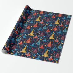 a wrapping paper with colorful christmas trees on it