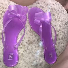 Very Cute Purple Jelly Sandals With Bow Practically Brand New Worn 1 Time For A Couple Of Hours. (Purple Not My Color) Cute Purple Open Toe Sandals, Cute Purple Sandals For Spring, Purple Summer Beach Sandals, Purple Summer Sandals For The Beach, Trendy Purple Sandals For The Beach, Purple Synthetic Summer Flip Flops, Purple Synthetic Flip Flops For Summer, Purple Open Toe Summer Flip Flops, Purple Spring Beach Flip Flops