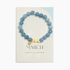 Details Freshly Picked Birthstone Bracelets help you remember the month you fell in love with your baby! Wear this bracelet as a bond between your soul and theirs. The March Birthstone Bracelet features aquamarine semi-precious stone beads to symbolize protection, joy, and health. Made with easy-to-wear elastic, each bracelet includes three gold moon phase charms to represent the women who came before you, the woman you are today, and the mom you hope to be. Get yours today! Features 8mm semi-pr Birth Stone Bracelets, Birthstone Beaded Bracelets, Light Blue Gemstone Bracelets As Gift, Light Blue Spiritual Bracelet As Gift, Adjustable Aquamarine Beaded Bracelet As Gift, Adjustable Aquamarine Beaded Bracelets As Gifts, Light Blue Gemstone Beaded Bracelets For Gifts, Light Blue Gemstone Beaded Bracelets As Gift, Light Blue Gemstone Beads Bracelets As Gift