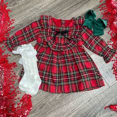 Baby And Toddler Girls Red Plaid Long Sleeve Christmas Dress Features Ruffles & Bow In Front. Zipper In Back. Winter Holiday Dress With Ruffles, Christmas Holiday Dress With Ruffles, Plaid Dress For Christmas Holiday, Holiday Dress With Ruffles For Christmas, Holiday Dress With Ruffles, Cute Winter Holiday Dress For Dress-up Occasions, Cute Holiday Dress For Winter, Cute Red Holiday Dress For Festive Occasions, Pink Check Dress