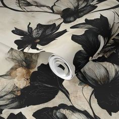 black and white floral wallpaper with leaves on it