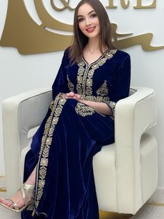 Caftan Naoual  is a must-have for any fashion enthusiast, constructed with premium materials and inspired by Moroccan fashion. Enhance your fashion knowledge with this superb piece, perfect for any event.   Length of the model: 165 CM Model wears size M / EU SIZE 38 Fabric: velvet Floor-length Blue Kaftan With Resham Embroidery, Moroccan Dress Kaftan Blue, Blue Silk V-neck Kaftan, Velvet Caftan Moroccan, Blue Embellished V-neck Kaftan, Moroccan Fashion, Dress Clothes For Women, Must Haves, Models