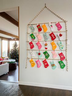 a christmas stocking display hanging on a wall