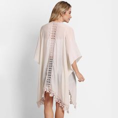 Size : One Size Material : 100% Polyester One Size V-neck Beach Outerwear, Chic Beige Poncho For Spring, Chic Beige Cape For Spring, Spring Cream Cape, Casual Beach Shawl Poncho, Chic Summer Poncho In Cape Style, Beige Shawl Poncho For Beach, Chic Summer Cape Poncho, Cream Poncho For Beach In Spring