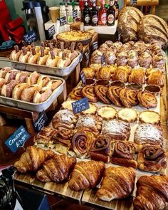 many different types of baked goods on display