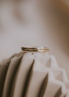 How do we take something from good to great? Hammer it! We took our teeny-tiny band game up a notch by giving it a beautiful hammered texture. ﻿Available in 14kt Gold Fill + Sterling Silver. Choose a size 2, 3 or 4 for a midi ring. Worn with our Dani Chain Ring and Teeny-Tiny Band. Love this ring? Check out our round (un-hammered) Teeny-Tiny Band version. Handmade in Eau Claire, WI. Our jewelry is handmade so each piece will be unique and may vary slightly from what is pictured. Copper Uses, Everyday Wear Jewelry, Good To Great, Hammered Band, Midi Ring, Midi Rings, Scarf Gift, Heart Studs, Jewelry Case