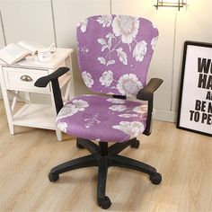 an office chair with purple flowers on it