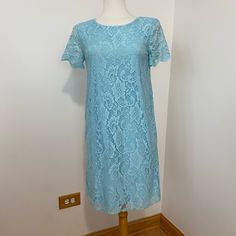 Baby Blue Color Beautiful Lace Over Solid Lining Armpit To Armpit Is Approximately 16 Inches Across When Laying Flat Back Of Neck To Bottom Is Approximately 33 Inches Ynf 4454 (M) Ynf 4455 (S) Blue Lace Mini Dress For Summer, Spring Party Light Blue Lace Dress, Blue Sheath Dress For Spring, Blue Short Sleeve Lace Dress For Summer, Light Blue Fitted Lace Dress For Spring, Blue Lace Spring Dress, Blue Lace Dress For Spring, Blue Lace Knee-length Dress, Light Blue Shift Dress With Short Sleeves