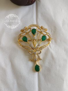 Beautiful Antique/Vintage style Pin/Brooch, base metal is guaranteed Pure Silver 925 and is real 18K Gold Filled which is very durable and will stay for years. Stones used are natural semi precious stone Green Onyx and Cubic Zirconia. Gold Filling is completely different from Gold Plating as gold filling contains 100% gold which does not go away easily and enhances the life and look of the jewelry. We used best quality Italian Pin mechanism for enhanced durability and comfortable wearing. Ceremonial Gold Brooches With 17 Jewels, Traditional Yellow Gold Brooches For Formal Occasions, Traditional Yellow Gold Formal Brooches, Formal Gold Gemstone Brooches, Traditional Yellow Gold Brooches As Gifts, Gold Gemstone Round Brooch, Gold Gemstone Round Brooches, Round Gold Brooches With Gemstone, Round Gold Brooch With Gemstone