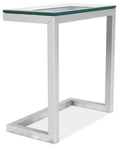 a glass and metal side table on a white background with the bottom half turned down