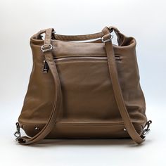 Chantal Backpack– a chic and versatile bag that can be used over your shoulder or a backpack designed to enhance your everyday style. Materials: Handcrafted from durable, high-quality leather Interior: 2 zippers and a pocket. Exterior- 3 zippers and a pocket. Carrying Options: The adjustable shoulder strap allows for comfortable shoulder or backpack wear. Luxury Leather-handled Satchel Backpack, Luxury Leather-handled Shoulder Backpack, Chic Leather Backpack With Zipper Pocket For On-the-go, Rectangular Leather Backpack With Anti-theft Pocket For Travel, Rectangular Leather Backpack With Zipper Pocket For On-the-go, Designer Backpacks, Leather Interior, Free Bag, Hobo Bag