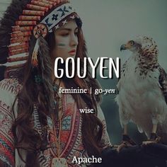 a woman with an eagle on her arm and the words gouyn above her