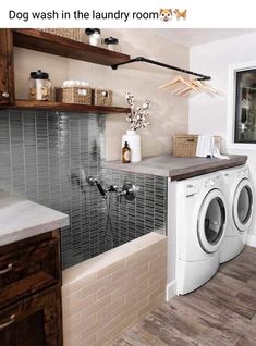 a washer and dryer in a small room with shelves above the washer