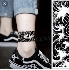 a pair of black and white shoes with tattoos on their ankles, next to an image of a woman's foot