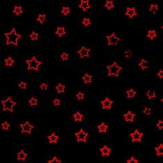 many red stars on a black background