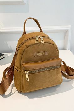 Bag size: Small Material: Suede Imported Product measurements: Length 8.7 in, Width 4.3 in, Height 8.7 in, Weight 8.1 oz Brown Portable Backpack For Everyday Use, Brown Everyday Use Backpack, Brown School Bag With Zipper Closure, Casual Brown Portable Backpack, School Bag With Zipper In Brown, School Bag With Zipper Closure In Brown, Casual Brown Backpack, Brown Portable Backpack For School, Brown Shoulder Bag For Back To School