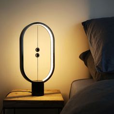 a lamp that is on top of a night stand