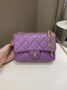 Chanel 22P Pending CC Flap BagPurple Lambskin Enamel AGHWSize 21.5 x 14 x 5 cmSingle chain drop 53 cmDouble chain drop 30 cmMicrochipFeb 20229.9/10 Like New (minimal storage signs if any otherwise like new)Includes full set box, dust bag and receiptPrice was 5900 sgdPrice now 5400 sgd 4080 usd CN5991-01 Chanel Mini Flap Bag, Minimal Storage, Chanel Mini, Purple Bags, Chanel Bags, Flap Bag, Satchel Bags, Chanel Bag, Chanel Classic