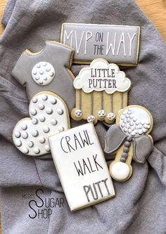 some cookies that are on top of a cloth with words written in white and black