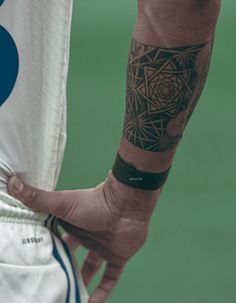 a person with a tattoo on their arm