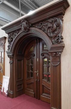 an ornate wooden entrance to a building