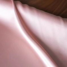 Description:This Blush Pink Silk Satin fabric offers a soft, lustrous finish with a gentle sheen, perfect for creating dreamy bridal gowns, evening dresses, and elegant accessories. The delicate blush pink hue brings a romantic and feminine touch, ideal for modern and classic designs. Its smooth drape ensures a fluid movement, adding a touch of luxury to every garment. Material Composition: 100% SilkWidth: 44.9 inches (114 cm)Care Instructions: Dry clean only. Avoid prolonged exposure to direct sunlight to maintain the vibrant color.Suggested Uses: Ideal for bridal dresses, evening gowns, lingerie, and flowy scarves. Its gentle drape and subtle shine also make it suitable for luxurious home decor accents like cushions and drapes. Conclusion: This Blush Pink Silk Satin fabric embodies roman Fluid Movement, Silk Satin Fabric, Dress Order, Elegant Accessories, Pink Silk, Custom Tailoring, Dress Size Chart, Dress Size Chart Women, Fabric Samples