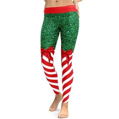 Women's Christmas Leggings. Spice up your Christmas workout and get into the holiday spirit. Festive christmas leggings for the gym, holiday parties, races, bar crawls or that festive IG story! Made with premium fabric that is buttery soft and four-way stretch. Versatile for fitness and everyday wear. Flattering mid rise waistband won?t roll down or dig into your skin. If you love a pair of christmas workout leggings that are as cute & festive as they are comfortable, you'll love our Candy Stripe Christmas Leggings. This particular print feature a distinctive perfectly crafted pattern you can not find elsewhere with rich and vibrant colors. Stylish, durable, and a hot fashion candy stripe Christmas leggings for the Holidays with premium fabric that is a four-way stretch and comfortably sof Fitted Bottoms For Christmas Holiday, Christmas Workout, Holiday Leggings, Christmas Leggings, Candy Stripes, Plus Size Leggings, Squat Proof, Red And White Stripes, Christmas Women