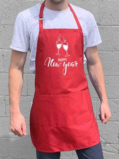 For the classy party host toasting in the new year. Premium quality 7oz twill apron with adjustable neck. Four front utility pockets 100% cotton apron Measures 30" long by 24" wide Machine wash cold with like colors. Tumble dry low. Professionally printed. Makes a great gift. Bbq King, Funny Aprons, I Grill, Grill Apron, Bbq Kitchen, Bbq Apron, Christmas Aprons, Aprons For Men, Printed Aprons