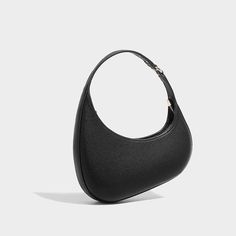 Go out in style with the Evelyn Moon Shoulder Bag, an exquisite underarm bag with a unique sailboat-inspired silhouette. Its sleek and irregular-shaped design exudes high-end fashion, making it a standout piece for any wardrobe. Its versatile structure fits all your essentials while effortlessly elevating your look. Treat yourself to this elegant and functional masterpiece! Now available in brown, black, khaki, and ivory. Luxury Black Smooth Grain Hobo Bag, Luxury Brown Vintage Hobo Bag, Modern Brown Bucket-shaped Hobo Bag, High-end Black Textured Leather Shoulder Bag, Luxury Bucket-shaped Hobo Bag With Detachable Handle, Luxury Designer Handbags, Everyday Bag, High End Fashion, Handbags On Sale