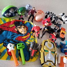 various toys are laying out on the floor