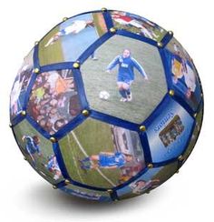 a soccer ball with pictures of people on it is shown in this image, the ball has been painted blue and gold