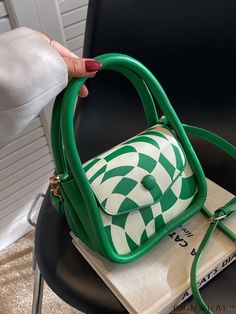 BagForLove - Compact Geometric Colorblock Square Bag Product Description Color Green Type Square Bag Bag Size Mini Strap Type Double Handle Pattern Type Geometric Style Fashionable Material PU Leather Size Chart INCH CM Strap Length Bag Length Bag Width Bag Height Handle Height 47.2 inch 7.1 inch 2.8 inch 5.5 inch 4.7 inch Strap Length Bag Length Bag Width Bag Height Handle Height 120 cm 18 cm 7 cm 14 cm 12 cm Details Pictures Similar Products h2 { text-align: center; } /* æ¢è¡ */ li{ white-sp Retro Green Shoulder Bag With Large Capacity, Green Retro Crossbody Shoulder Bag, Retro Green Crossbody Shoulder Bag, Retro Green Tote Shoulder Bag, Retro Green Satchel Shoulder Bag, Retro Green Bags With Adjustable Strap, Green Retro Shoulder Bag For Shopping, Retro Green Shoulder Bag Satchel, Retro Green Bag With Removable Pouch