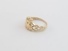 14k Solid Yellow Gold Irish Claddagh Ring!! Material: 14k gold , Not plated or filled Metal Purity: 14k gold , Stamped Ring weight: 2.4 grams Ring size: Available from size 5 to 8 Finish: Shiny puffed heart Complementary Gift Box Images may be enlarged to show detail and the item may look larger than it appears in person.In order to reduce buyer remorse and return please pay attention to the photos and read description to make sure about measurements such as size , thickness, and length before t Gold Stackable Rings Hallmarked 14k, Gold Heirloom Heart Ring In 14k Gold, Heirloom 14k Gold Heart Ring, 14k Gold Heart Ring In Fine Jewelry Style, Gold 14k Heart Ring In Fine Jewelry Style, Hallmarked Gold Heart Ring, Yellow Gold Round Heart Ring, Tarnish Resistant, Gold Hallmarked Heart Ring In Fine Jewelry Style, 14k Yellow Gold Heart Ring With Round Band