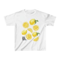 Add a pop of summer to your wardrobe with our Lemons Graphic Baby Tee! This 90s-inspired design features a fun and playful aesthetic, perfect for any fashion-forward individual. Made with high-quality materials, our easy peasy lemon squeezy baby tee is both trendy and comfortable. A must-have addition to your Y2K collection and a unique gift for her. The model is wearing an XS size. Lemon Tshirts, Lemon Clothes, Lemon Outfit, Printed Tshirt Outfit, Lemon Shirt, Easy Peasy Lemon Squeezy, Playful Aesthetic, Lemon Top, Graphic Baby Tee