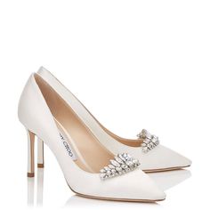 Brand New Jimmy Choo Ivory/Crystal 85 Romy Embellished Pointed-Toe Pump The Classic Romy Heel Gets A Contemporary Update In Chic Ivory Satin. Leather Lined And With A Leather Sole, The 85mm Heel Height Creates A Leg-Lengthening Effect. Take Centre Stage At Your Next Party In These Head Turning Heels. Satin With Crystal Embellishment Stiletto Heel Leather Lined Leather Sole Heel Height Measures: 85mm/3.3 Inches Made In Italy This Product Uses Responsible Satin A Mix Of 28% Organic Silk And 72% Ce Jimmy Choo Wedding Heels, Enchanted Shoes, Jimmy Choo Wedding Shoes, Fancy Footwear, Half Shoes, Heels Aesthetic, White Weddings, Ladies Footwear, Dr Shoes