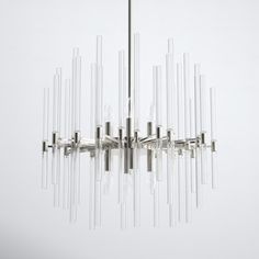 Streamlined forms create an unexpectedly lavish effect in this modern chandelier. Its eight lights are refracted through a nimbus of clear glass rods held at varying heights + lengths by slim steel arms in a polished finish. The smaller size makes a statement without overwhelming your space. AllModern Finish: Polished Nickel AllModern Divine-Mini Chandelier in Polished Nickel | Size 21.75" H X 23.5" W X 23.5" D Traditional Chandelier, Sputnik Chandelier, Mini Chandelier, Stevie Nicks, Royal Wedding, Modern Chandelier, All Modern, Polished Nickel, Lighting Fixtures