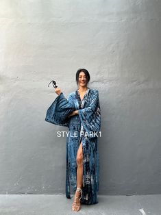 Bali Tie dyed Kimono long jacket,  It's made by the Bali's traditional hand Tie dyed  If you are very small this may be too big.  Matching bag and belt are included  Stylepark1 Model  -Her height is 175Cm/5.74ft weight is 57kg/126lb /American size, she wore  ~ M  size.  Made from soft Rayon   At first, you may smell the unique dye. It will disappear after you wash it. So do not worry. Color : Bali hand tie dyed -Niagara  Blue & multi  motif    One size fits all      Model wore / A  A - Length - Kimono Dresses For Women, Beach Apparel, Tie Dye Kimono, Hand Tie, Long Kimono, Diy Sewing Clothes, Long Jacket, Kimono Dress, Holiday Looks