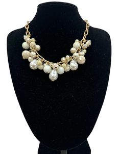 Add a touch of bohemian charm to your outfit with this stunning necklace. The beads are made of high-quality beads and come in a beautiful beige colour. The necklace features faux baroque pearls and glass beads, adding a touch of elegance and class to the design. The metal used for the necklace is alloy zinc, which is both durable and lightweight. The necklace is a perfect addition to any costume jewellery collection and is suitable for any occasion. The bohemian style and beaded design make it a unique and eye-catching accessory. Whether you're dressing up or dressing down, this necklace will surely add a touch of sophistication to your outfit. Neck Length :18inches, 45cm( Adjustable) Materials: Zinc Alloy, Beads, Faux Baroque Pears Large Gold Earrings, Beige Colour, Pearls Necklace, Beaded Statement Necklace, The Bohemian, Faux Pearl Necklace, Body Chain Jewelry, Choker Necklaces, Stunning Necklace