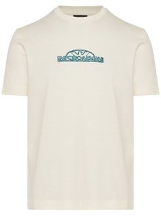 Find EMPORIO ARMANI Logo-embroidered Crew Neck T-shirt on Editorialist. ivory white cotton embroidered logo to the front crew neck short sleeves straight hem Armani Logo, City Shorts, Balenciaga Triple S, Summer Beach Wear, T Shirt Vest, Ivory White, Light Jacket, Logo Embroidered, Jacket Style