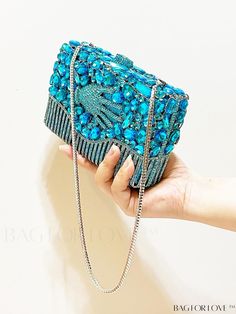 BagForLove - Light Blue Luxury Rhinestone Evening Bag: Bridal Clutch with Crystal Detailing Product Description Color Baby Blue Details Rhinestone Magnetic Yes Strap Type Chain Pattern Type Graphic Bag Size Mini Style Glamorous Closure Type Magnet Type Box Bag Material Zinc Alloy Composition 100% Metal Size Chart INCH CM Bag Height Bag Length Bag Width Strap Length 4.7 inch 6.7 inch 2 inch 19.7 inch Bag Height Bag Length Bag Width Strap Length 12 cm 17 cm 5 cm 50 cm Details Pictures Similar Products h2 { text-align: center; } /* æ¢è¡ */ li{ white-space: normal; word-break: break-all; word-wrap: break-word; } .red-box { width: 100%; display: flex; flex-direction: row; flex-wrap: wrap; justify-content: center; } .red-box > div { width: 190px; height: 250px; margin: 10px; } .red-box > div > Bridal Clutch Purse, Bridal Clutch Bag, Blue Luxury, Bridal Clutch, Evening Purse, Bag Luxury, Word Wrap, Mini Fashion, Blue Crystals