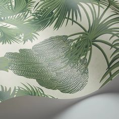 an image of a wallpaper with green leaves on it's back drop down