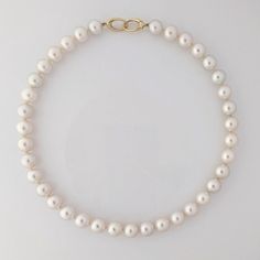 Featuring a high quality White South Sea pearl necklace, this piece secures with a 14K yellow gold interlocking oval clasp. The enticing 100% natural color - a pure white with a gentle hint of pink overtone. Pearls' size ranges from 10.3 to 11.6 mm, and are round or near round in shape. You'll be captivated by their high luster. The surface of the pearls is 85-90% clean, presenting only a few natural blemishes. These small imperfections, or nature's kisses, serve as undeniable evidence of their South Sea Pearl Necklace, Pearl Clasp, Sea Pearl, South Sea Pearls, Saved Items, South Seas, Pearl Size, Pure White, Timeless Pieces