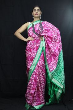 Exclusive hand-woven Sambalpuri silk saree with Pasapali Finest pure handwoven sambalpuri ikat silk saree with traditional motifs woven by the master weavers of Sambalpur, Odisha. It has lovely patterns and is world-famous for its stunning colours, texture and designs. Occasion: Party Wear Fabric: Sambalpuri Primary Color: Pink Secondary Color: Green Material: Mulberry Silk/ Sambalpuri Silk Pattern: Motif Border Type: Ikkat Border Size: Medium Blouse Piece: Included Care: Dry Clean Disclaimer : This is a genuine handwoven piece, unevenness in the selvedge and weave could be expected and colours may fade or bleed due to the traditional dyeing method employed. Traditional Green Ikat Print Saree, Green Ikat Print Saree In Traditional Drape, Green Ikat Print Traditional Saree, Transitional Art Silk Saree With Ikat Print, Green Ikat Print Traditional Drape Wear, Green Traditional Wear With Ikat Print And Traditional Drape, Green Traditional Wear With Ikat Print Drape, Green Traditional Wear With Ikat Print, Transitional Ikat Print Art Silk Saree