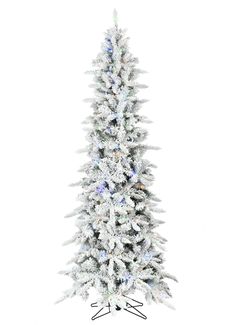 a white christmas tree with snow on it